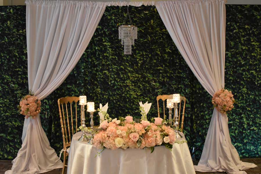 Chandelier with sweetheart table