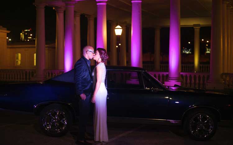 Fuschia Uplighting on Columns | Rent online for $19/each + free shipping both ways nationwide at www.RentMyWedding.com/Rent-Uplighting