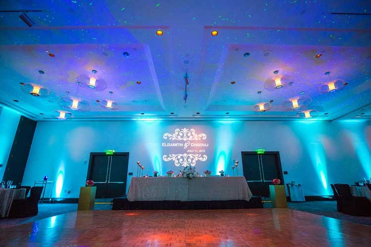 Blue Wireless Uplighting for a Wedding Reception | Rent online for $19/each + free shipping both ways nationwide at www.RentMyWedding.com/Rent-Uplighting