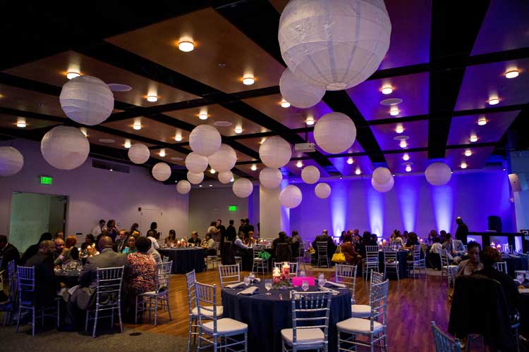 Purple uplighting for corporate event | Rent online for $19/each + free shipping both ways nationwide at www.RentMyWedding.com/Rent-Uplighting