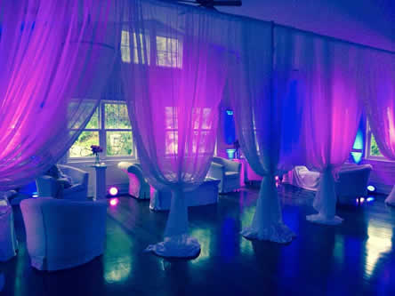 Uplighting on drapes | Rent online for $19/each + free shipping both ways nationwide at www.RentMyWedding.com/Rent-Uplighting